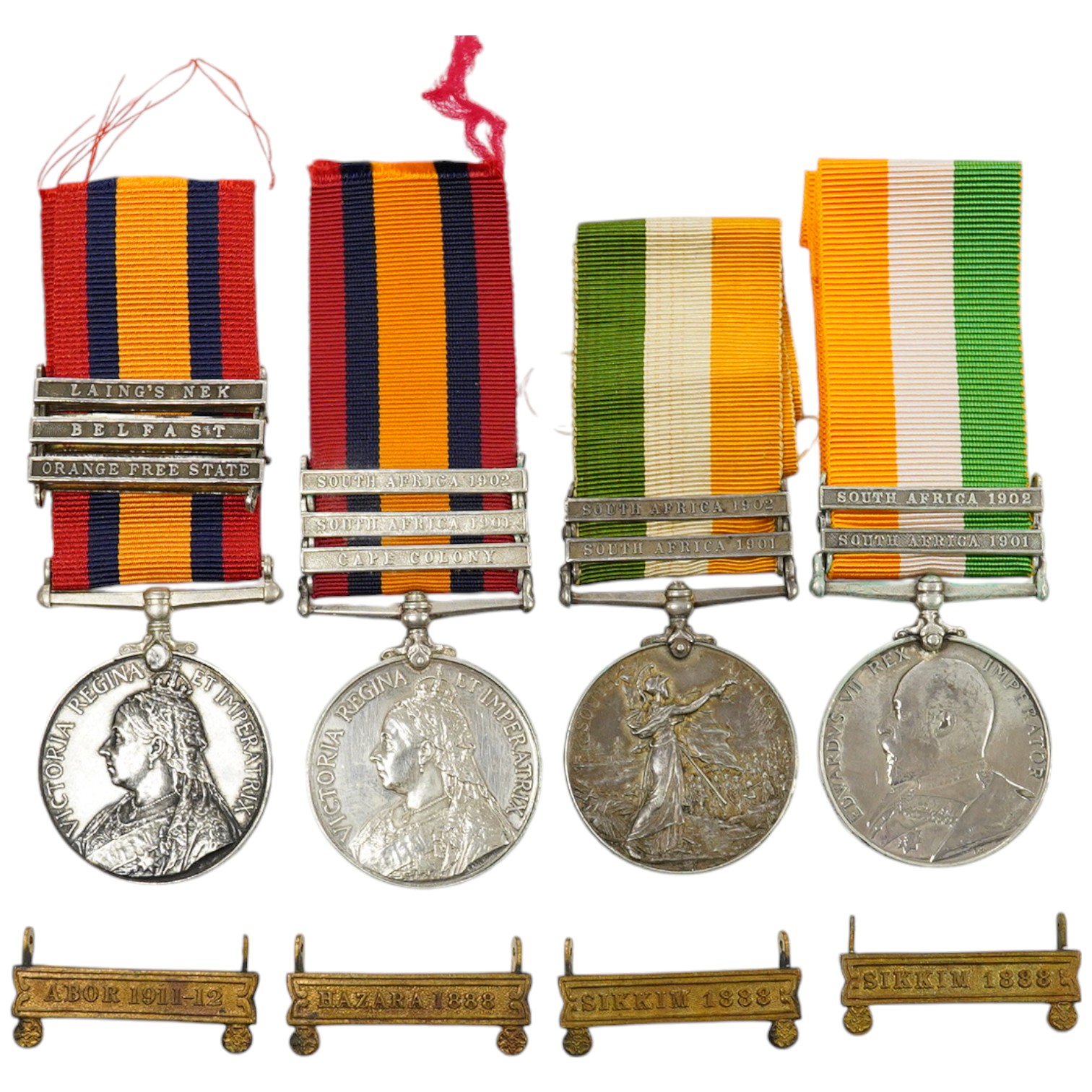 A Queen's South Africa Medal with Laings Nek, Belfast and OFS clasps to 12036 Bomr M.Miller R.F.A.Arty, another unnamed with 1901, 1902 and CC clasps, and two King's South Africa medals both with 1901/1902 clasps to 6408